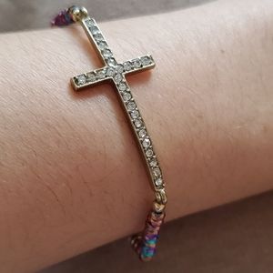 Purple beaded cross stretch bracelet w/ stones